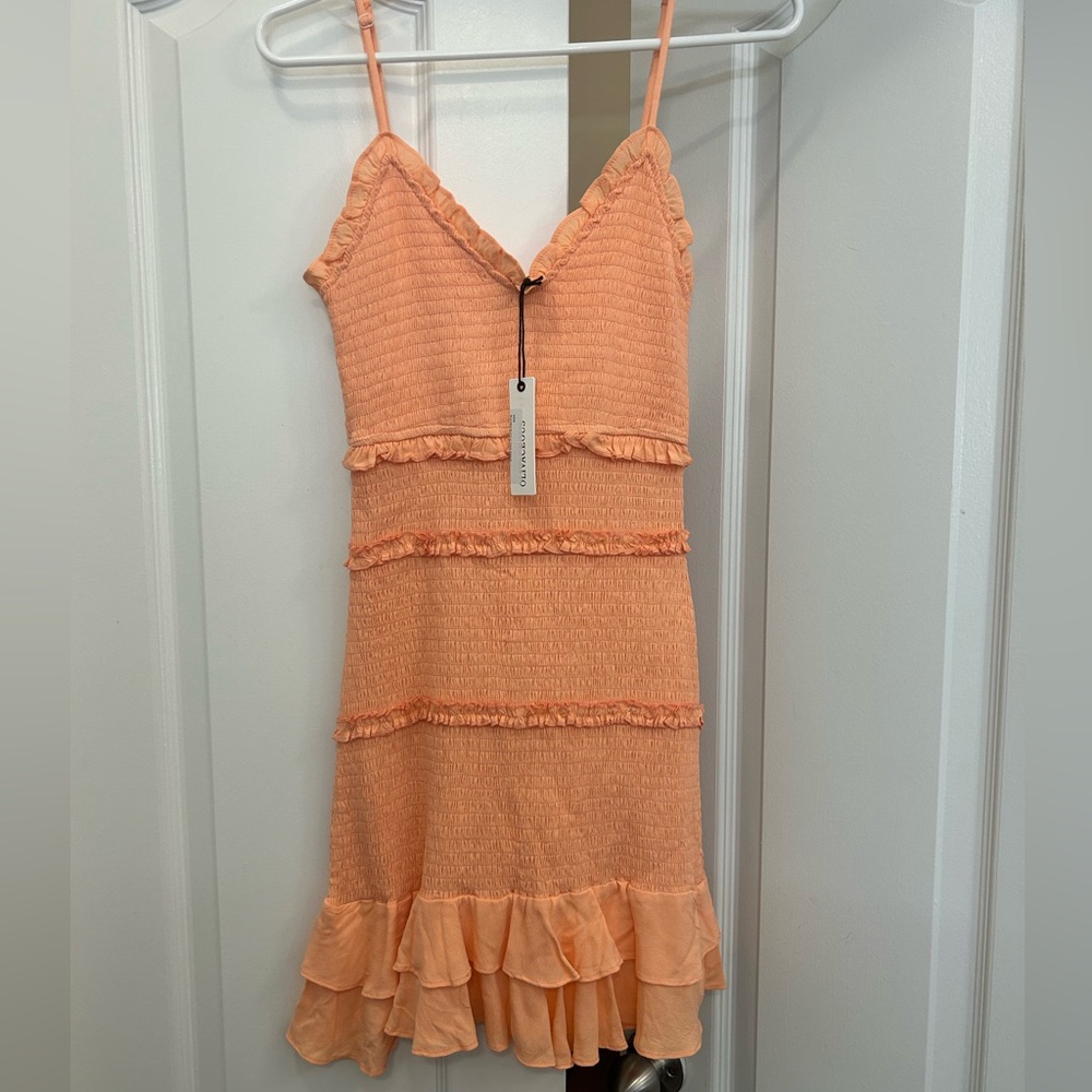 Light pink bodycon ruffle mini dress